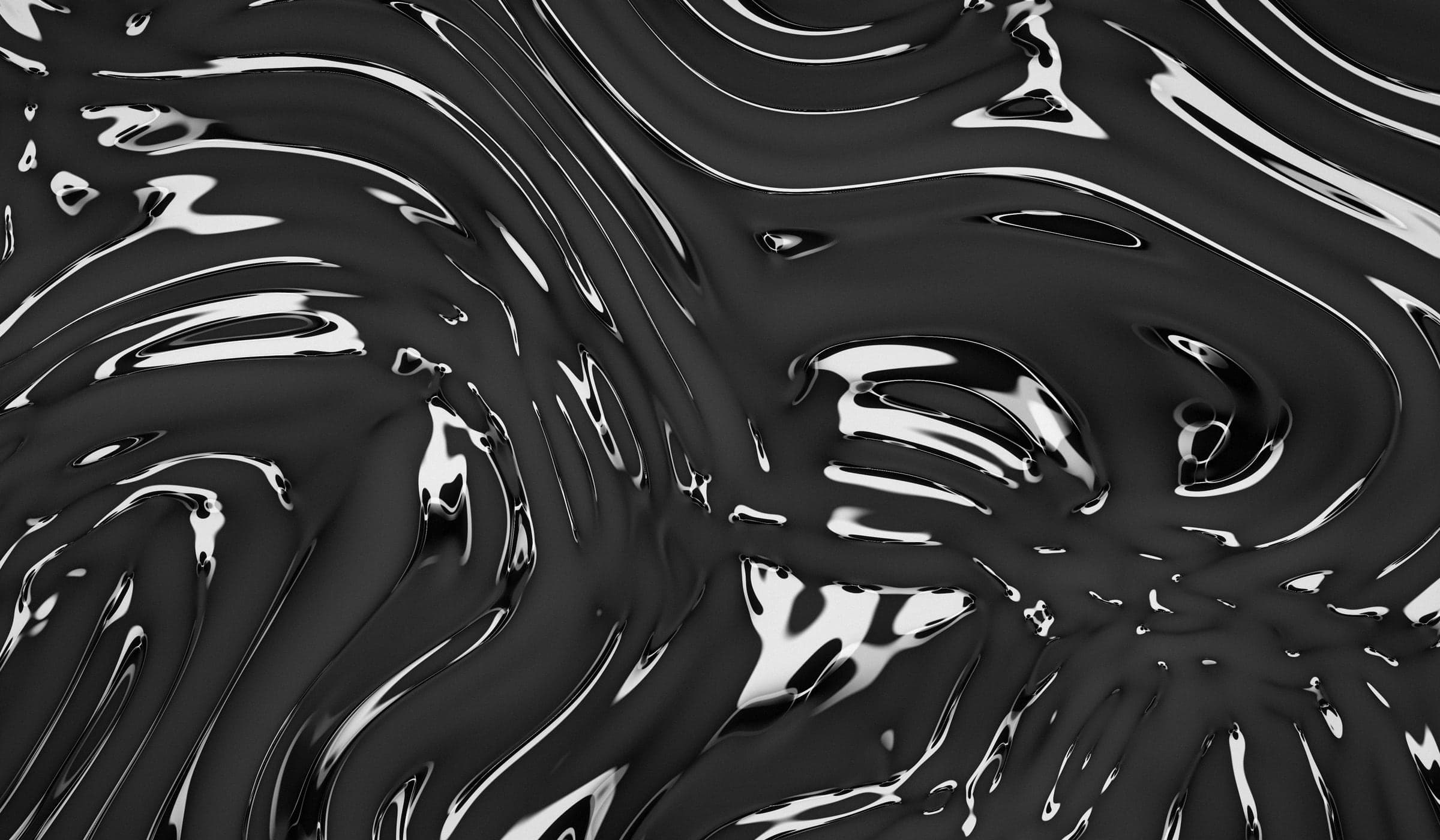 Liquid chrome surface catching studio light