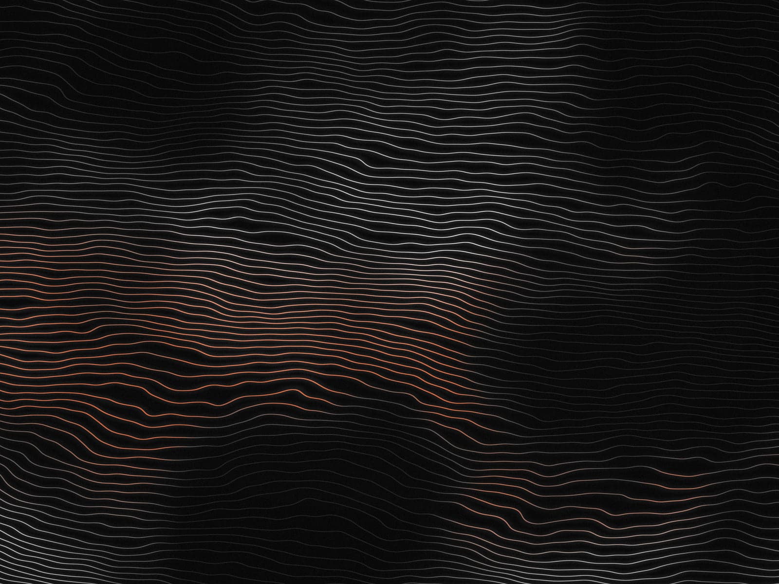Fine lines of light flowing across a dark field